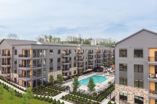an aerial view of an apartment building with a swimming pool at Stonehill at West Orange, West Orange, 07052