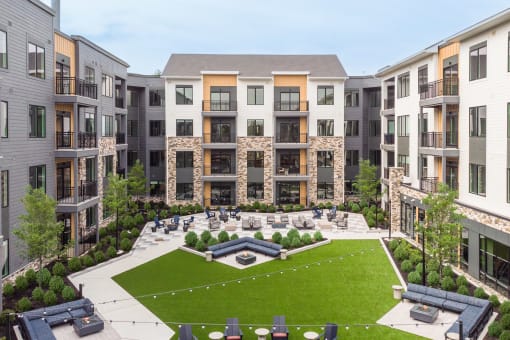 an aerial view of an apartment complex with a green courtyard at Stonehill at West Orange, New Jersey, 07052