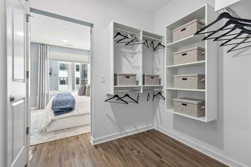 Walk-in closet with organized shelving and storage at The Piermont Apartments, Hillsdale