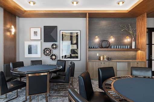 A modern dining room with a round table and chairs at The Reserve at Pearl River Apartments, Pearl River, NY, 10965