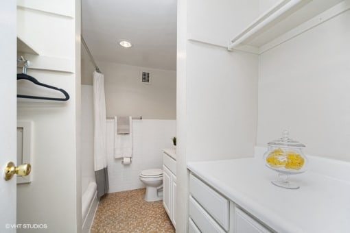 a bathroom with a toilet and a sink