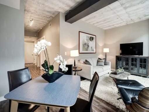 a room filled with pillows on top of a bed at Coda on H Apartments, Washington, DC