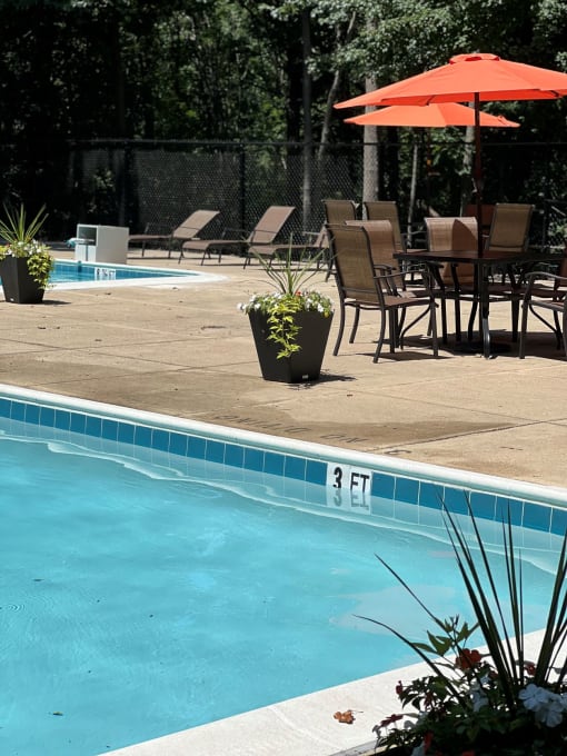 Poolside Dining Table at The Forest Apartments, Rockville, Maryland