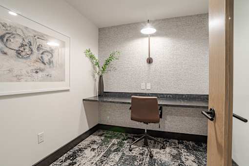 Contemporary home office with builtin desk at The Yancey Apartments, Charlotte
