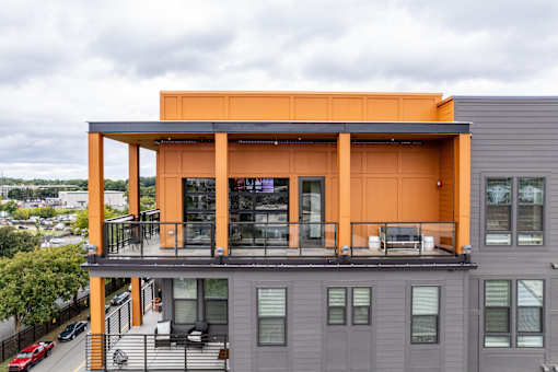 Rooftop terrace with covered pavilion and outdoor seating at The Yancey Apartments, Charlotte
