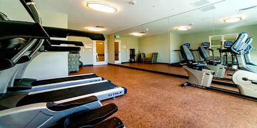 Gym with Elliptical Machines at Chapel Springs Apartments, Perry Hall, MD