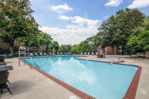 Swimming Pool With Lounge Chairs at Columbia Pointe, Columbia, Maryland 