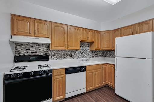 Kitchen with wooden closet at Columbia Pointe, Columbia, MD, Maryland 