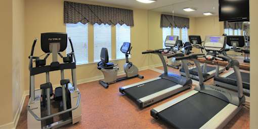 Gym with a Treadmill at Hammarlee House Apartments, Glen Burnie, MD, 21060