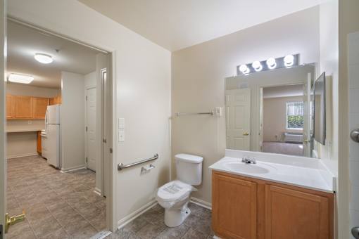 Well-lit bathroom at River Point Apartments, Essex, MD