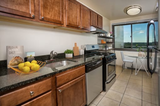 wood cabinets and granite countertops at Colesville Towers Apartments, Silver Spring, Maryland