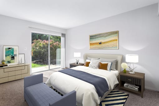 bedroom at Creekside at Taskers Chance in Frederick, MD with bed with white and blue linens, bedroom bench, nighttables and dresser