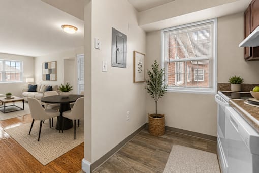 Furnished dining area and open concept kitchen at University Landing Apartments, Silver Spring, MD 20903