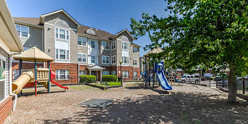 a group of colorful wooden signs in a park at Windsor Crossing, Maryland 