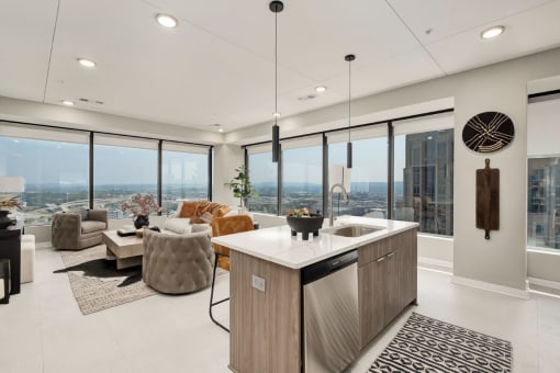 a kitchen and living room with a view of the city at The 600 Apartments, Birmingham