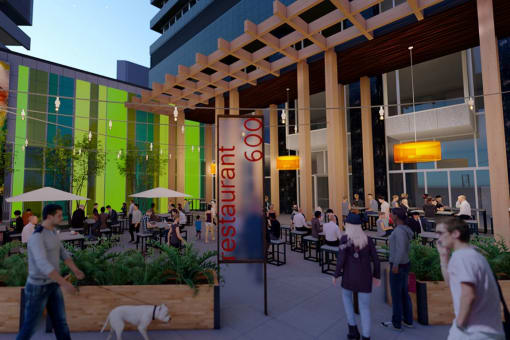 a rendering of the exterior of a restaurant with people and a dog at The 600 Apartments, Birmingham, AL 35203