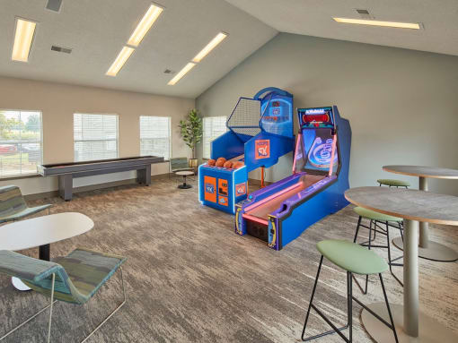 an activity room with games and tables at the preserve at greatstone