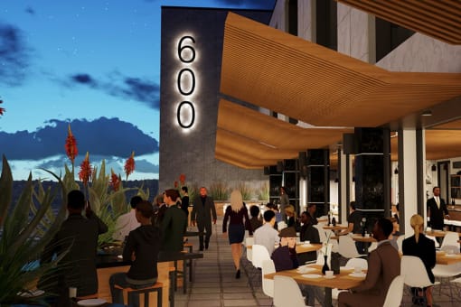 a rendering of people sitting at tables at a restaurant at The 600 Apartments, Alabama