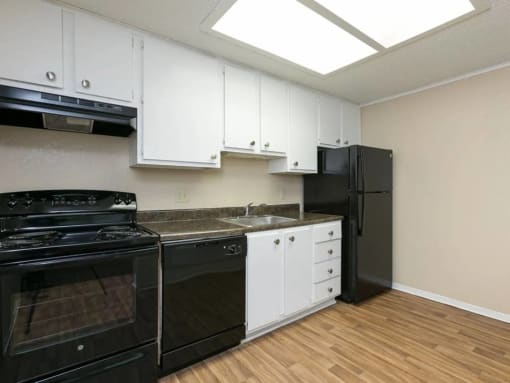 Spacious Kitchen With Pantry Cabinet at Elevate Woodstock Apartmnets, Georgia