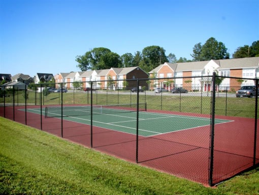 our apartments showcase a tennis court at Chester Village Green Apartments, Chester, VA, 23831