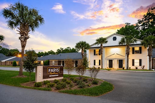 The image shows a building with a sign that reads "FARIS" in front of it.