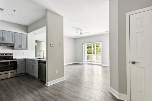 A kitchen with a stove top oven and a dishwasher.