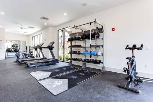 a gym with weights and exercise equipment in a house