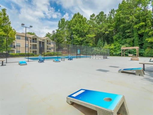 gaming center with cornhole boards at avenues of kennesaw at Avenues of Kennesaw East & West, Kennesaw, 30144