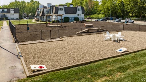 a large dog park with agility courses and agility ropes