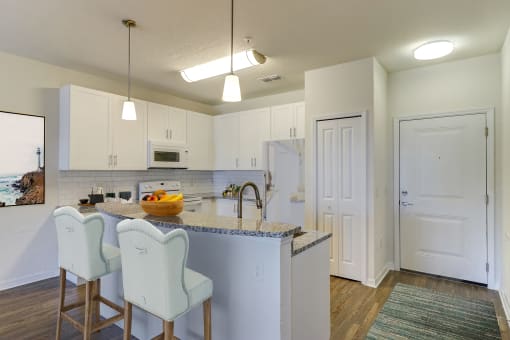 Fitted Kitchen With Island Diningat Century Avenues Apartments, Florida, 33813