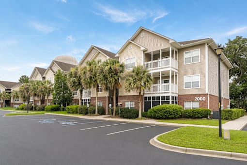 Apartment complex with the number 2000 on the front building.