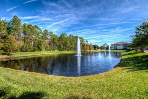 Large Lake with Fountains and Trail Including Outdoor Exercise Equipment at Century Bartram Park, Florida, 32258