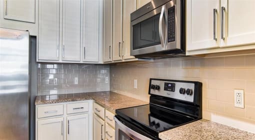 Cabinets in kitchen at Eleven 85 Apartments, Atlanta, GA, 30318