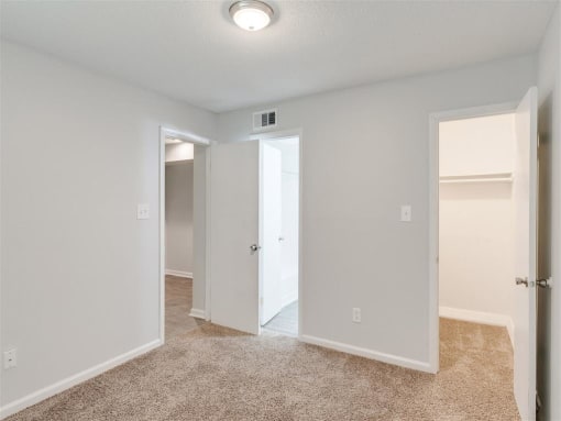 Bedroom With Closet at The Hub at 934 Apartments, Atlanta, GA, 30349