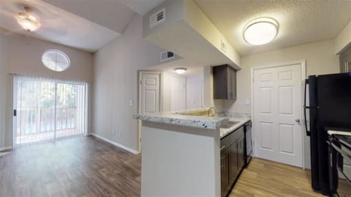 Kitchen And Living at The Hub at 934 Apartments, Atlanta, 30349