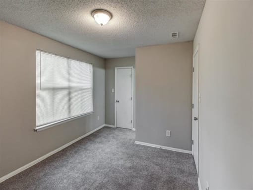 Beige Carpet In Bedroom at The Hub at 934 Apartments, Georgia, 30349