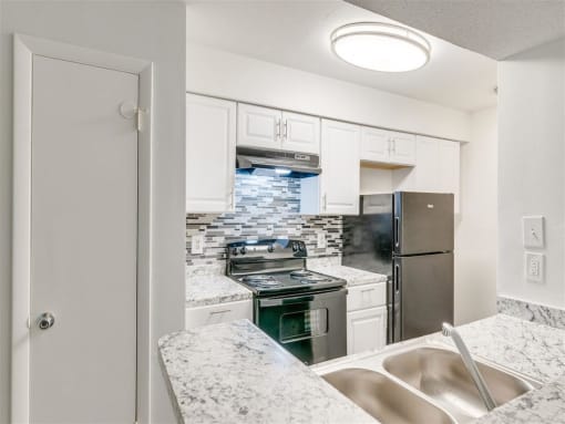 Sink With Faucet at The Hub at 934 Apartments, Atlanta, 30349