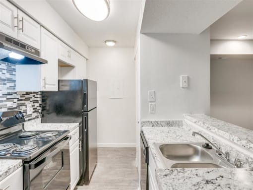 Granite Countertop Kitchen at The Hub at 934 Apartments, Atlanta, GA