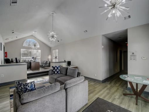 a living room with a couch and a table at The Sapphire, Decatur, GA