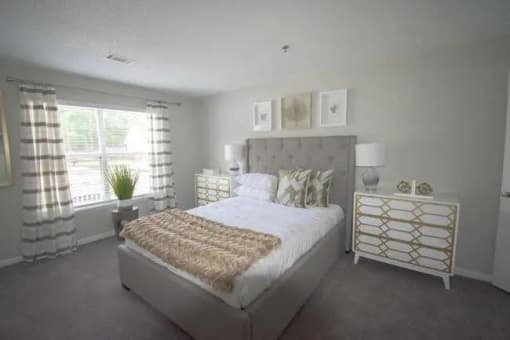 a white bedroom with a bed and a window  at The Sapphire, Decatur, GA, 30035