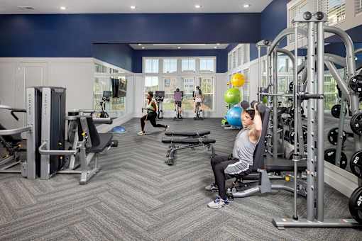 Fitness center at Century Mundy Mill Apartments, Oakwood, GA