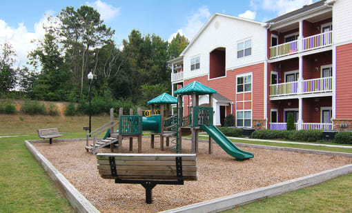 Playground with bench at the Haven at Reed Creek Apartments Martinez, GA