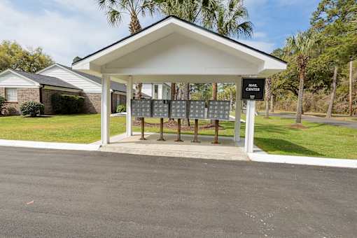 A mailbox is located on the side of a road.