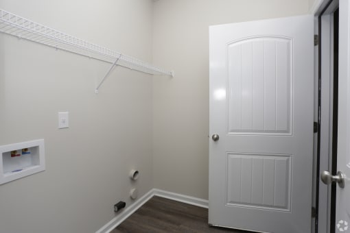 Laundry room with washer and dryer hookups at Highborne aartments Augusta, GA