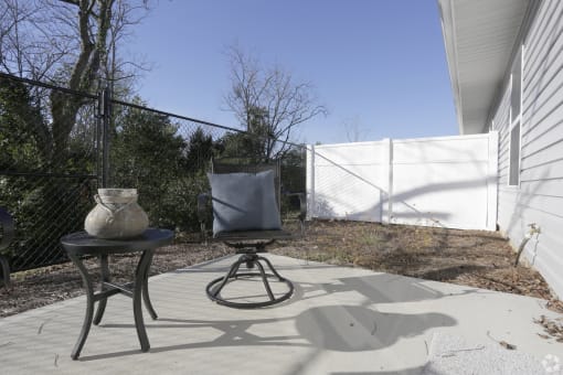 Spacious patio with privacy fence at Highborne apartments Augusta, GA