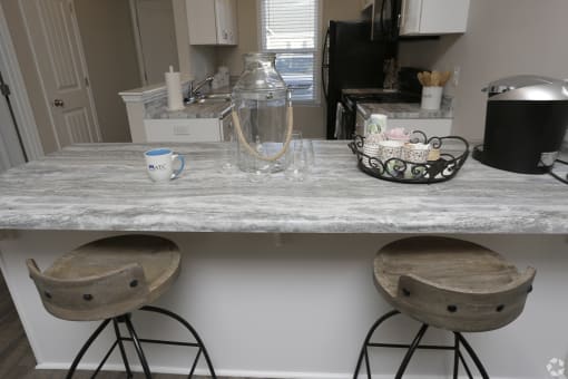Large kitchen countertop with breakfast bar at Highborne apartments Augusta, GA