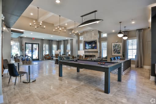 our resident clubhouse has a games room with a pool table and a flat screen tv