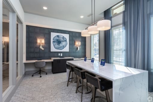 a conference room with a long table and chairs