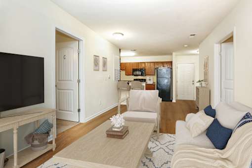 a living room with a couch and a tv