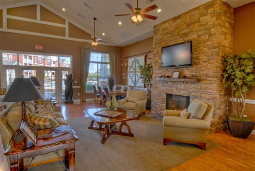 Spacious club house with tv and furniture at the Haven at Knob Creek Apartments, Johnson City, TN